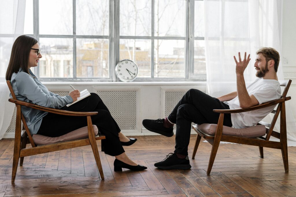 Two people talking about mental health and psychiatry
